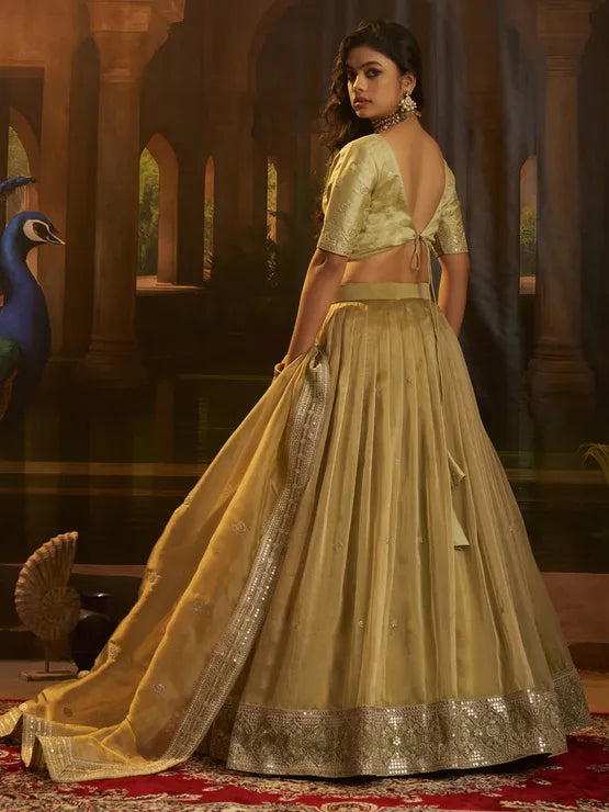 Yellow crepe silk festive lehenga set for women by Viyanka Collections
